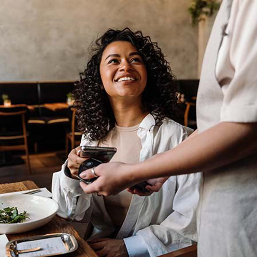 Woman paying bill